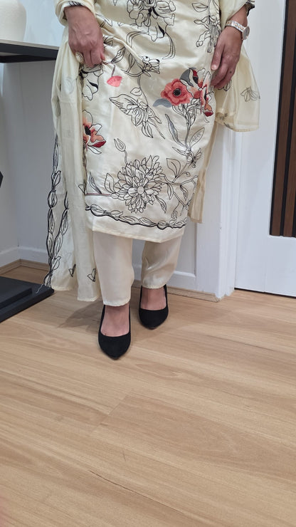 Shimmery glossy suit in Roman glass fabric
